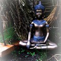statute of meditating person